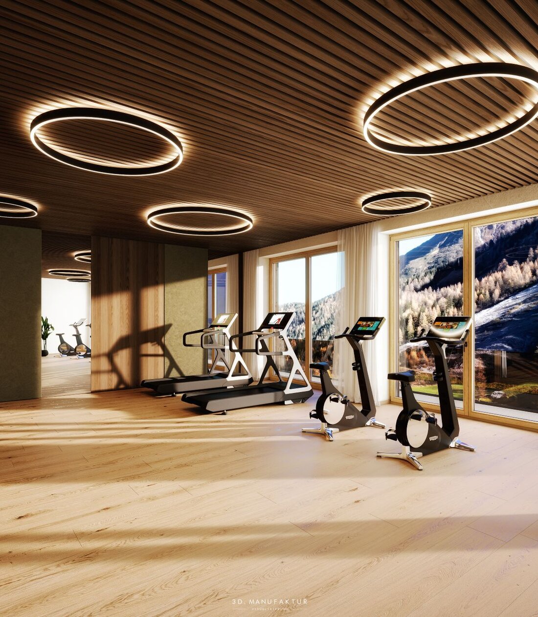 Ein schöner Interior Fitnessraum mit mehreren Geräten.