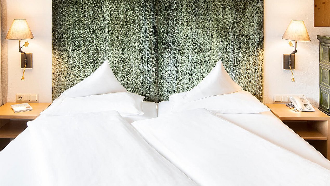 Bett Juniorsuite Enzian