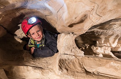 Kind in der Spannagel Höhle